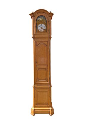 a tall wooden grandfather clock that is standing in front of a white background
