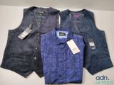 three men ' s vests are lined up on a table