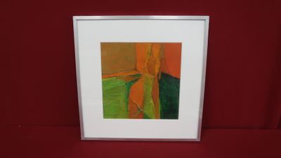 painting on a red wall with a white frame with a picture of a cross