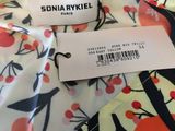 an image of a close up of a person ' s shirt with a label on it