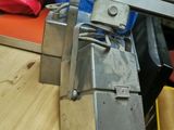 a picture of a machine that is cutting a piece of wood