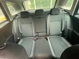 two seats in the back of a car that are empty