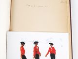 an open book with a drawing of a man in a red coat