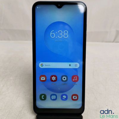 a close up of the back of a black smartphone