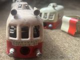 a toy train that is sitting on the ground