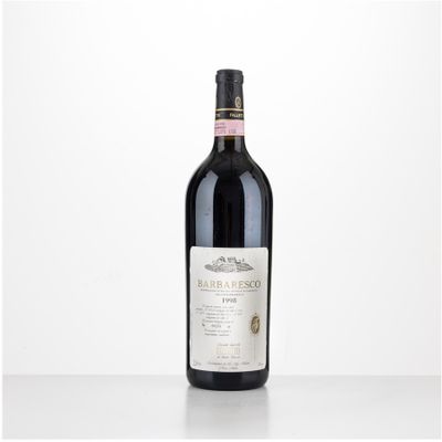 a bottle of wine that is sitting on a table