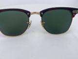 a pair of sunglasses on a white surface with a white background