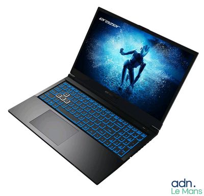 lenovo laptop with a blue keyboard and a man on the screen