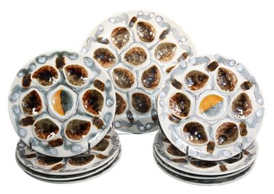 four plates that are sitting on top of each other