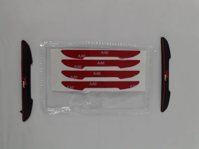 four knives in a plastic bag on a white surface
