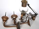 a light that is on the wall next to a lamp