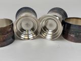 several different types of tins are lined up on a white surface
