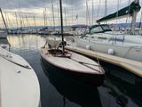 many boats that are docked in the water