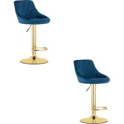 paire de tabourets de bar en velours bleu avec un piètement doré