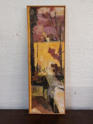 an image of a painting on a table next to a white wall