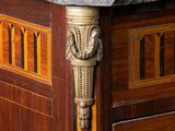 a marble top on a wooden cabinet with a marble top