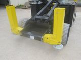 a close up of a fork attachment on a forklift