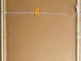 painting of a yellow bird sitting on a wire with a message written on it