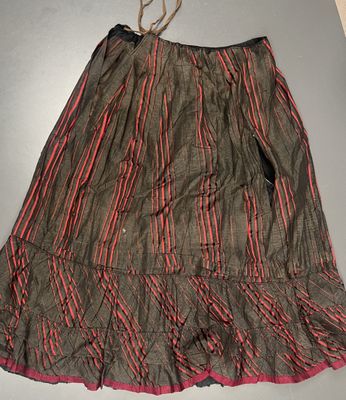 a close up of a skirt on a table on a table