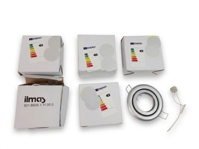 four boxes of electronic devices are sitting on a white surface