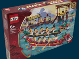 une boîte de Lego avec une image représentant des personnes dans un bateau