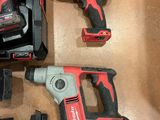 two tools that are sitting on a table