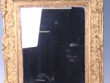 a mirror that is sitting on a table