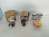 three different types of valves on a white table