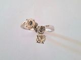 bague en argent massif ornée d'un motif de fleur et de feuilles