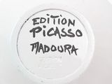 a white plate with writing on it that says edition picasso maddura
