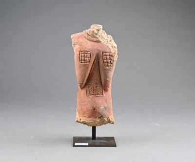 an image of a clay statue of a woman ' s head on a stand
