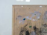 une photo d'une photo d'un tableau sur le mur