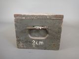 a small wooden box with a handle on it