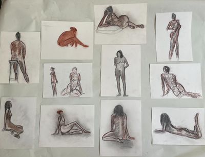 sketches of a man and a woman sitting on a bed next to each other