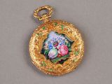 an image of a gold locke with a picture of a bird and flowers on it