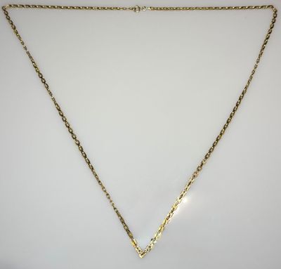 a gold chain necklace with a heart pendant on a white background