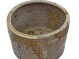 a brown pot with a white background on a white surface