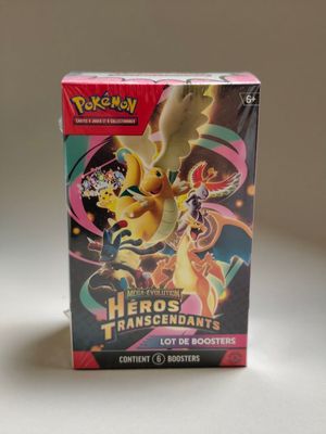 une boîte de cartes pokemon posée sur une table