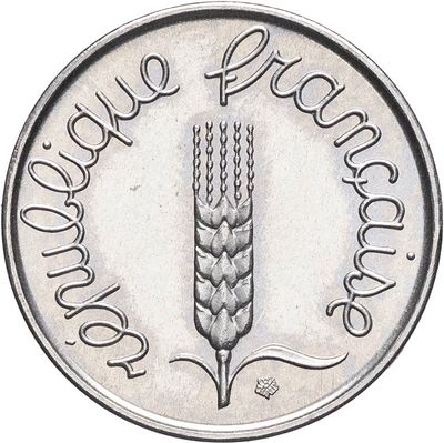une image représentant une pièce d'argent sur laquelle figure le dessin d'une plante