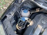 a car engine with the hood up and the hood down
