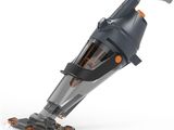 a close up of a vacuum cleaner on a white surface