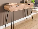 une table en bois avec deux tiroirs et un miroir accroché au mur