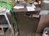 an image of a dirty kitchen with a dishwasher and a trash can