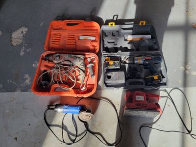 many tools that are laying out on the floor