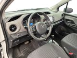 the interior of a car with a steering wheel and dashboard controls