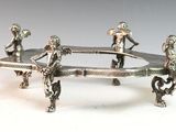three figurines that are sitting on a table