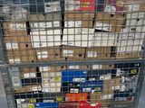 a large metal cart with many boxes on top of it