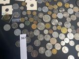 a lot of coins on the table with a price tag