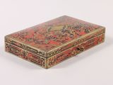 an image of a red and gold box on a white background