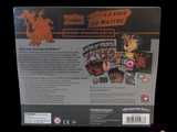a box of pokemon trading cards with a picture of a dragon